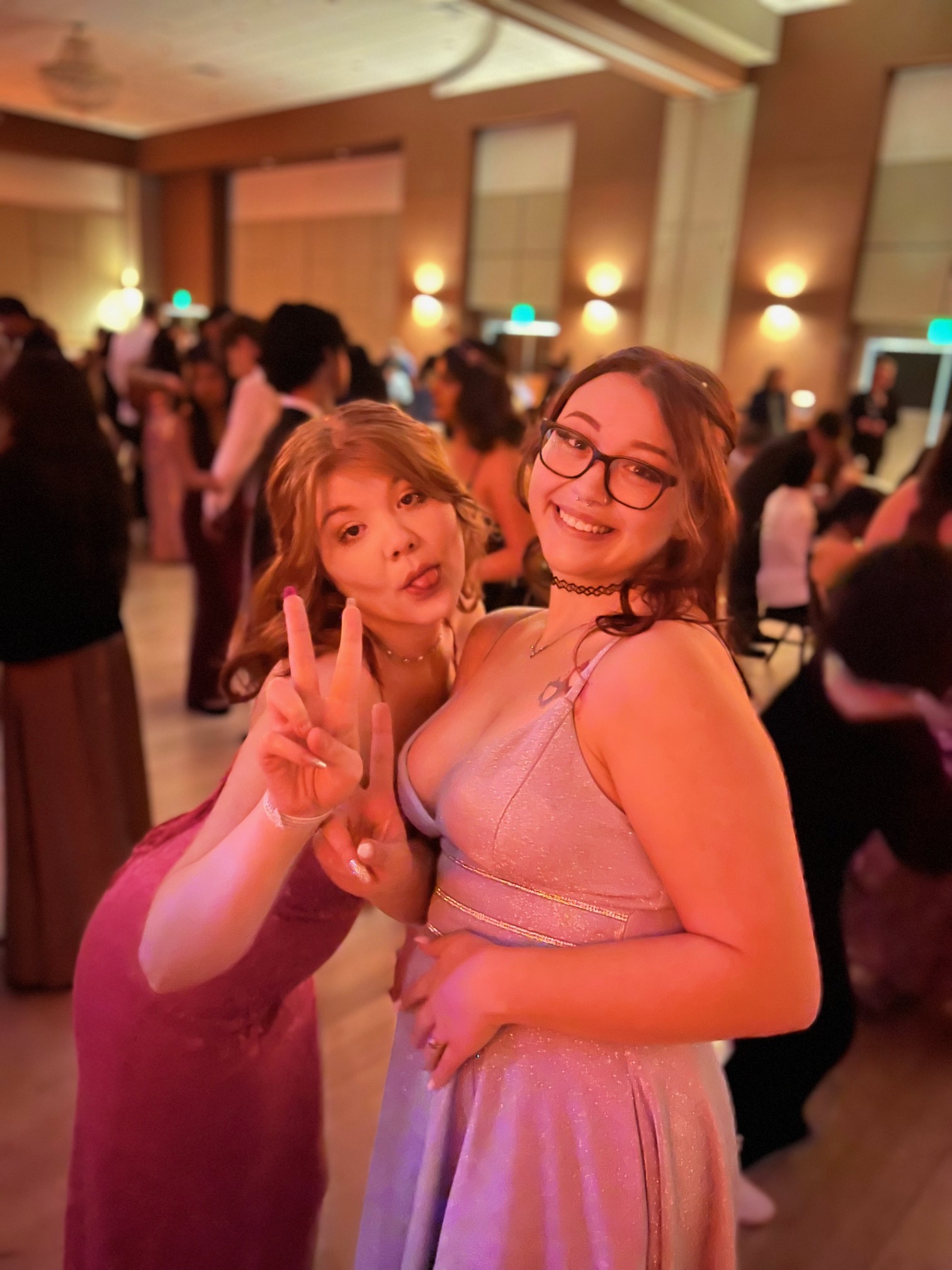Friends posing at a school dance